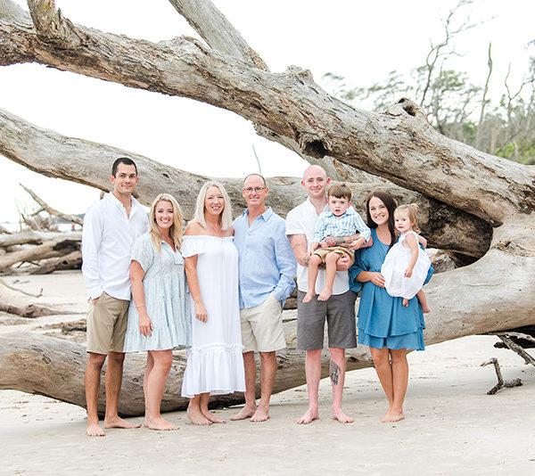 Family portraits at Driftwood Beach in Big Talbot Island