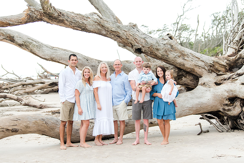 Family portraits at Driftwood Beach in Big Talbot Island